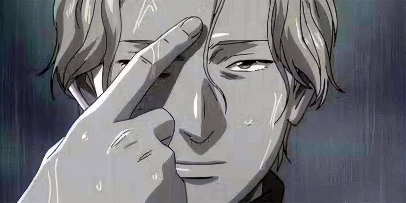 
Johan points to his forehead in Naoki Urasawa's 'Monster.'
