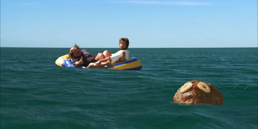 Two of the cast in an inflatable raft see a ham floating in the water in It's Always Sunny in Philadelphia.