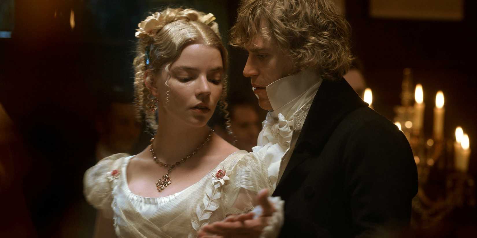 Emma, played by Anya Taylor-Joy, dances with Mr. Knightley, played by Johnny Flynn