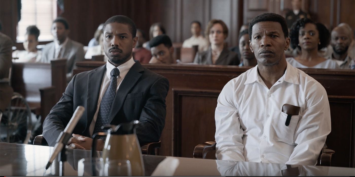 Michael B. Jordan and Jamie Foxx in a courtroom in Just Mercy