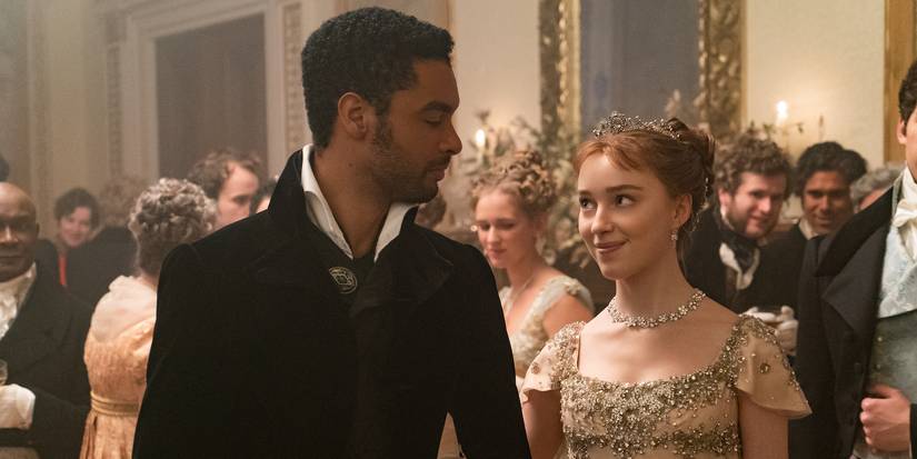 Simon Basset (Regé-Jean Page) & Daphne Bridgerton (Phoebe Dynevor) at a ball in Bridgerton Season 1