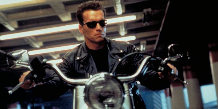 Arnold Schwarzenegger as the T-1000 riding a motorcycle in Terminator 2.