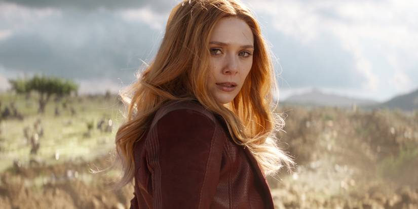 Scarlet Witch (Elizabeth Olsen) standing in a field in Avengers: Infinity War