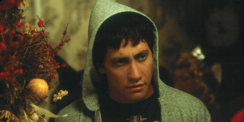 Jake Gyllenhaal as Donnie, wearing a hoodie and looking displeased in Donnie Darko