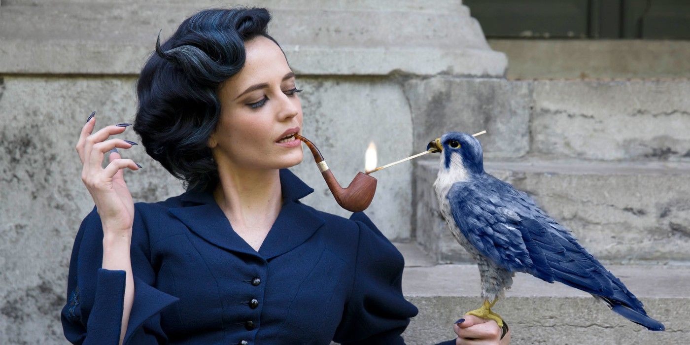Eva Green as Miss Peregrine with her pipe being lit up by a bird in Miss Peregrine's Home for Peculiar Children.