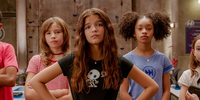 A group of girls looking at the camera in We Can Be Heroes.