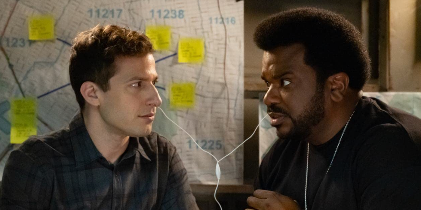 Andy Samberg & Craig Robinson sharing headphones on Brooklyn Nine-Nine