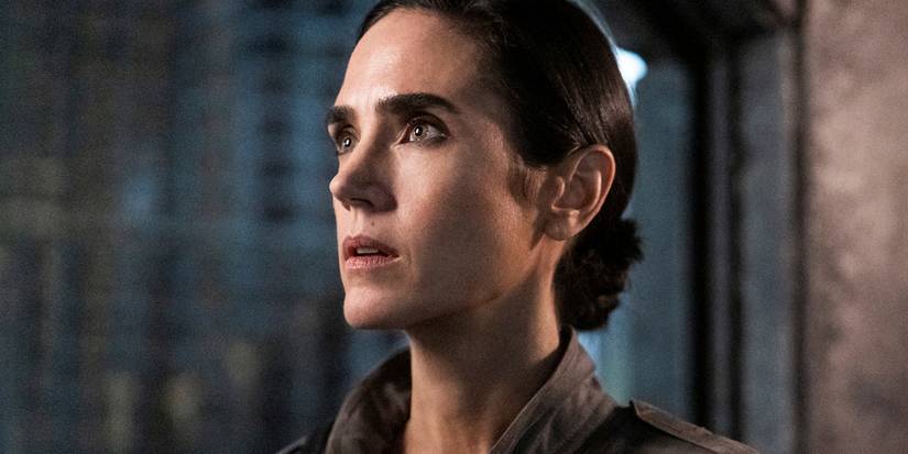 Jennifer Connelly as Melanie looking at a person offscreen in Snowpiercer