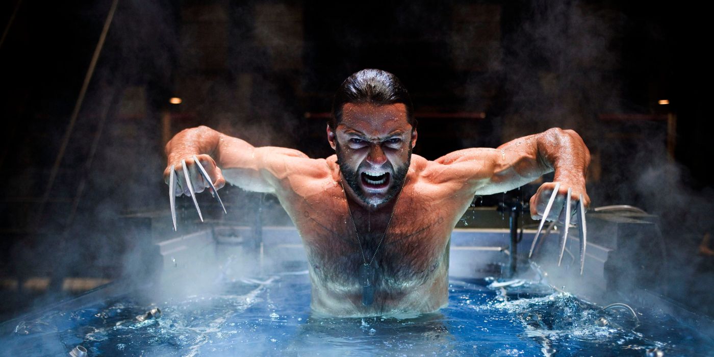 Hugh Jackman as Wolverine, rising angirly out of a water tank with his claws out in X-Men Origins: Wolverine