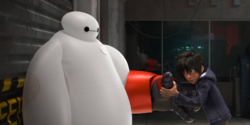 Hiro tries to put hand armor on Baymax in Big Hero 6