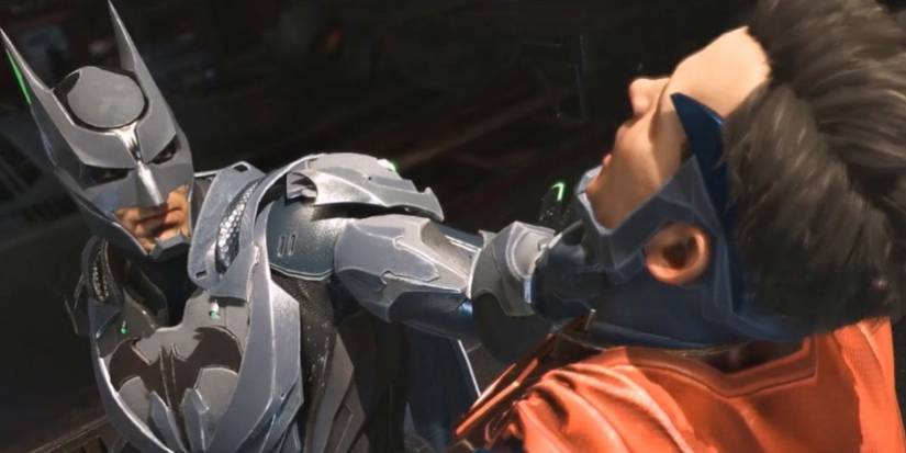 Batman choking Superman in Injustice 2