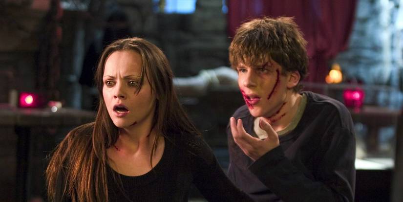 Jimmy and Ellie look bloodied and worried in Cursed. 