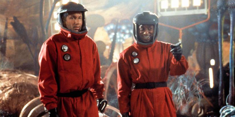 Two men in hazmat suits in Evolution
