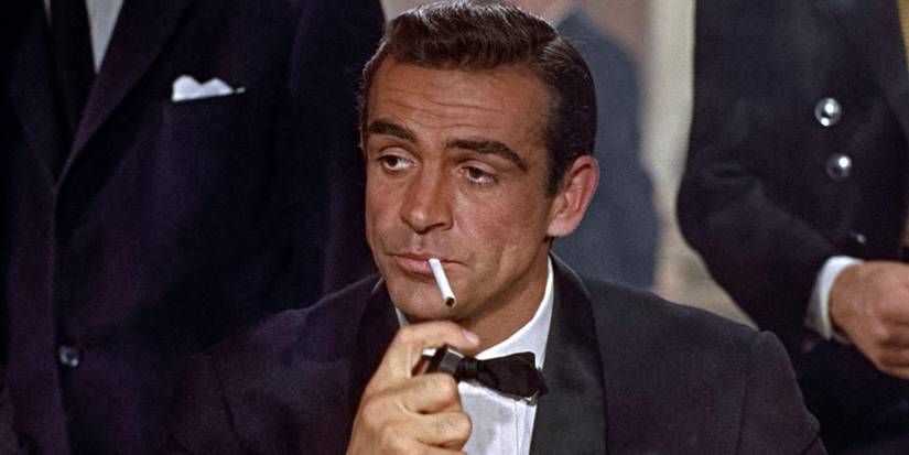 Sean Connery as James Bond lighting a cigarette in Dr. No