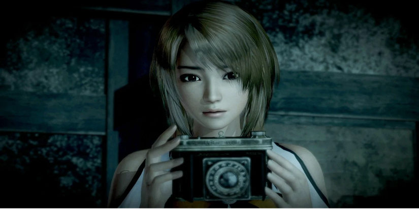 A young woman holding a camera in fatal-frame