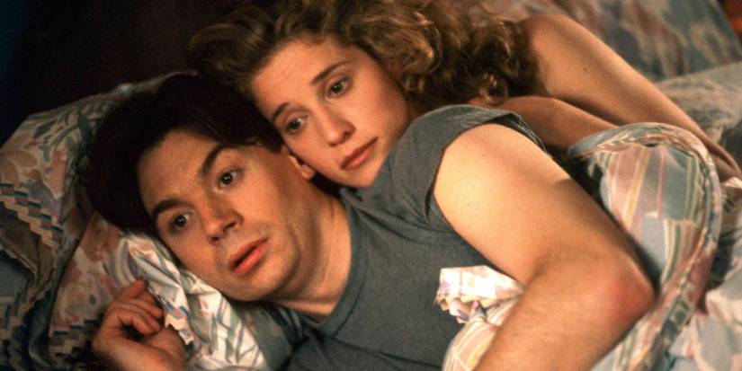 Michael Meyers in So I Married an Axe Murderer: Harriet hugging a surprised-looking Charlie in So I Married an Axe Murderer.