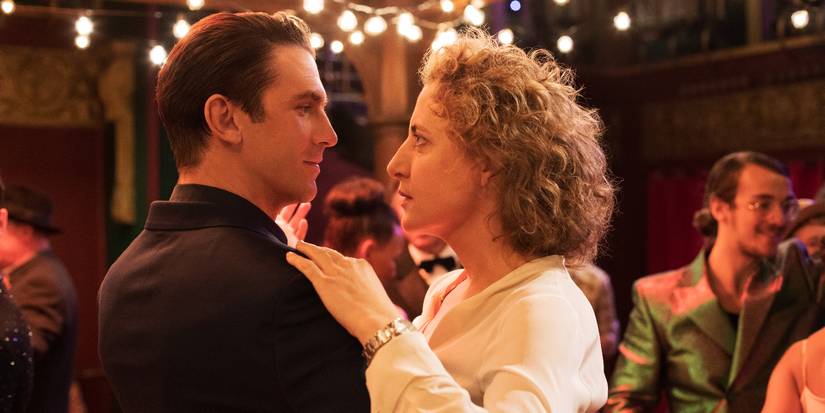 Alma and Tom dancing at a party in I'm Your Man.
