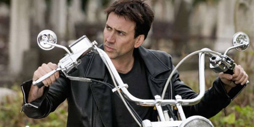 Nicolas Cage riding his motorcycle as Jonny Blaze in Ghost Rider