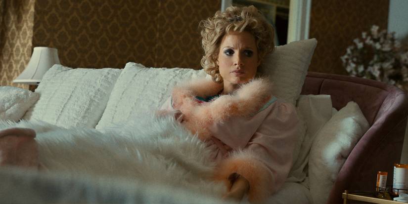 Tammy Faye Bakker in bed in The Eyes of Tammy Faye