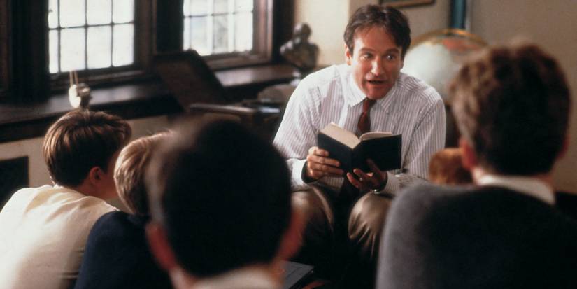 Robin Williams in Dead Poets Society reading a book to students