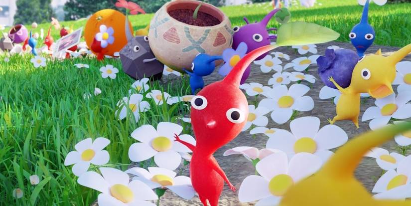 A red Pikmin waving hello to the camera.