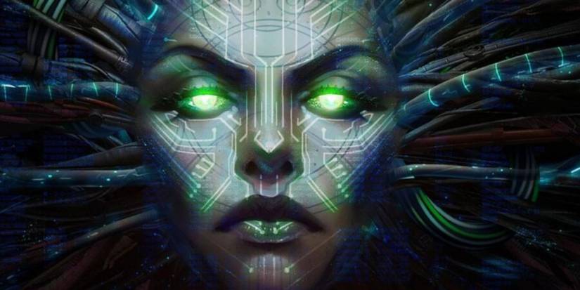 A woman with glowing green eyes and wires coming out of her in System Shock
