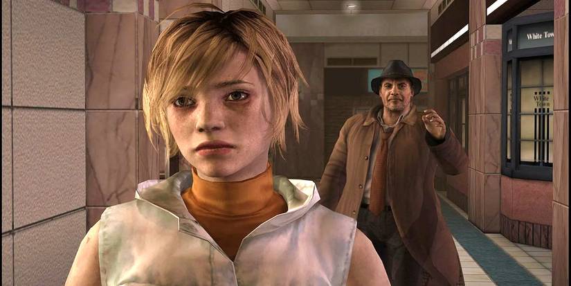 A man walking behind a woman in Silent Hill 3