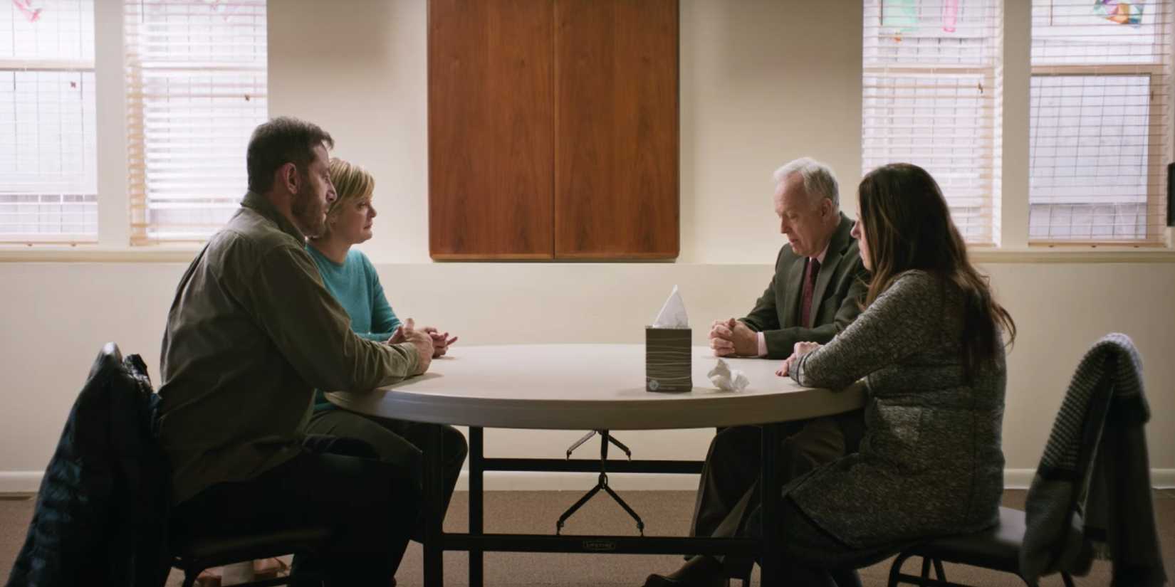 Two couple sit and discuss a tragedy in Mass