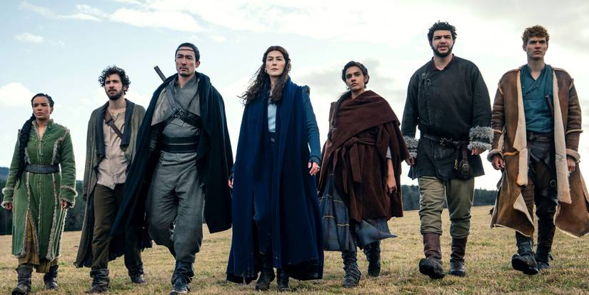 the full ensemble cast of The Wheel of Time walking towards the waygate.&nbsp;