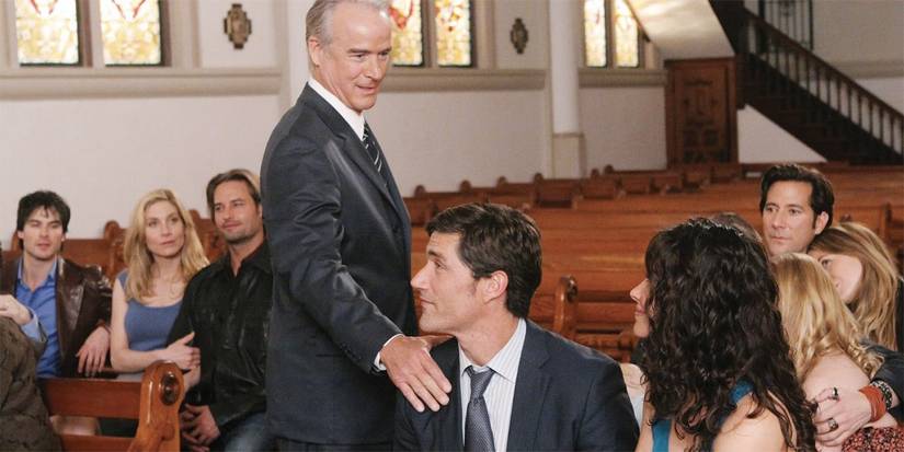 Cast members sit in the pews of a church and look happy in the finale of Lost. 