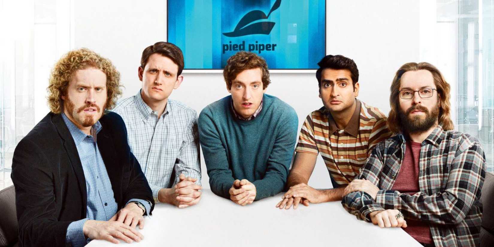 The Silicon Valley cast sitting at a table