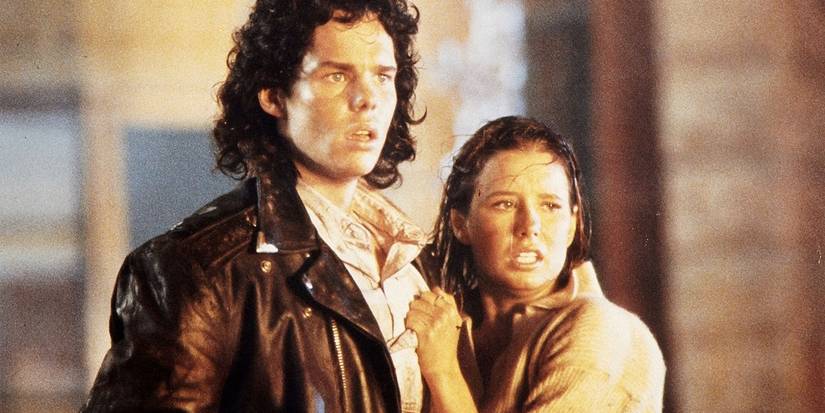 the blob, with shawnee smith clutching kevin dillon in fear and shock 