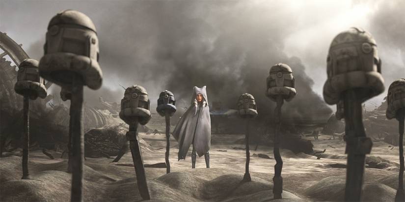 Ahsoka looks at storm trooper helmets mounted on shallow graves in Star Wars: The Clone Wars.