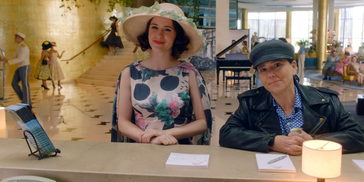 Midge (Rachel Brosnahan) and Susie (Alex Borstein) at a hotel counter in 'The Marvelous Mrs. Maisel.'