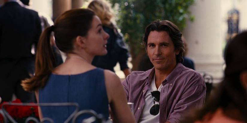 Bruce Wayne And Selina Kyle at a restaurant in The Dark Knight Rises