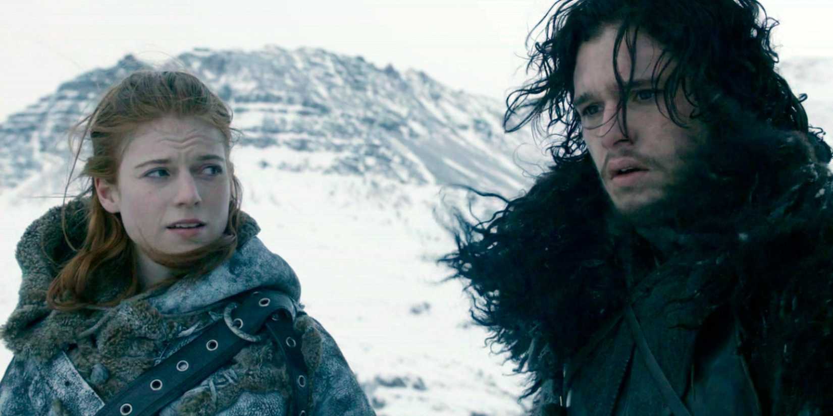 Jon Snow and Ygritte standing in the snow in Game of Thrones.