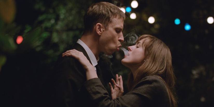 Elvind blowing smoke into Julie's mouth in The-Worst-Person-in-the-World