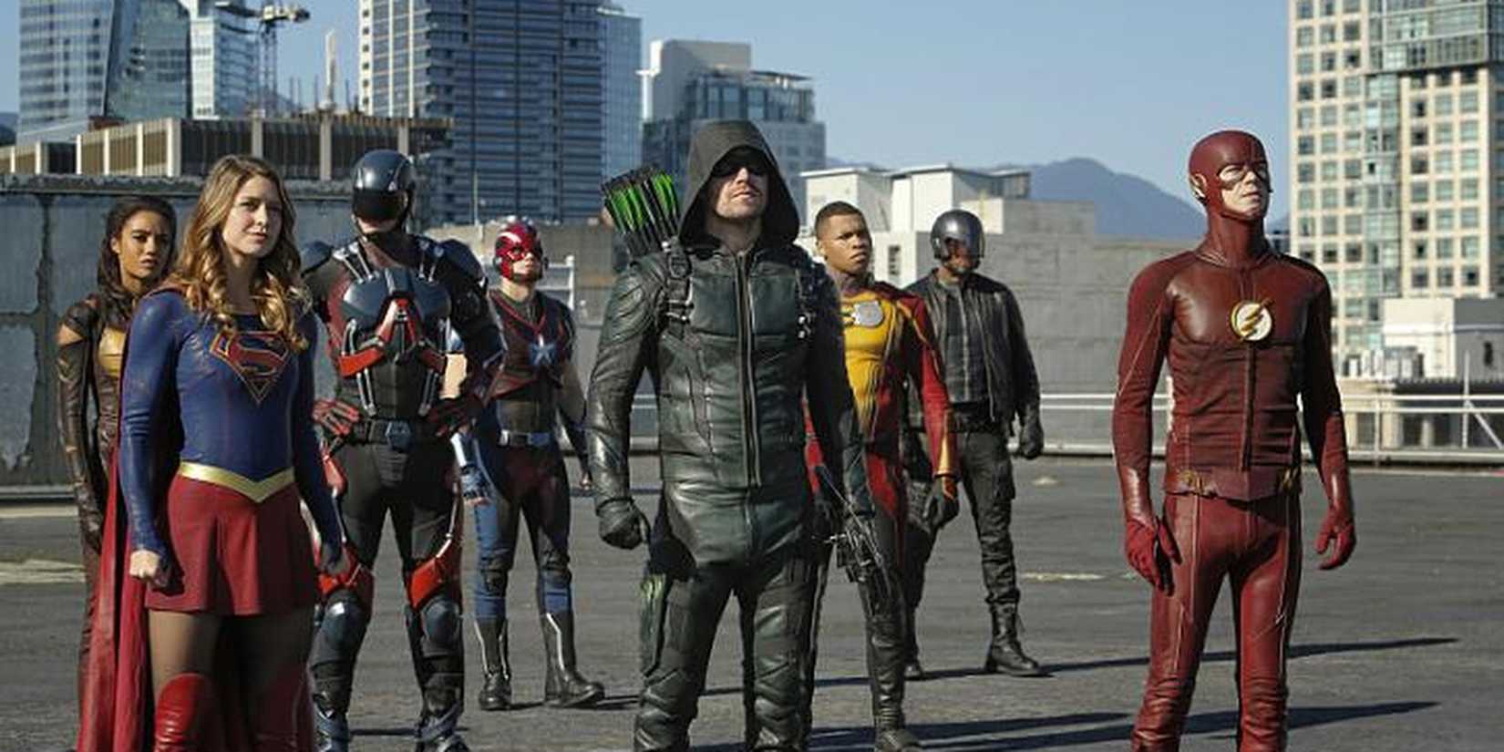 The Arrowverse heroes standing together against a common enemy