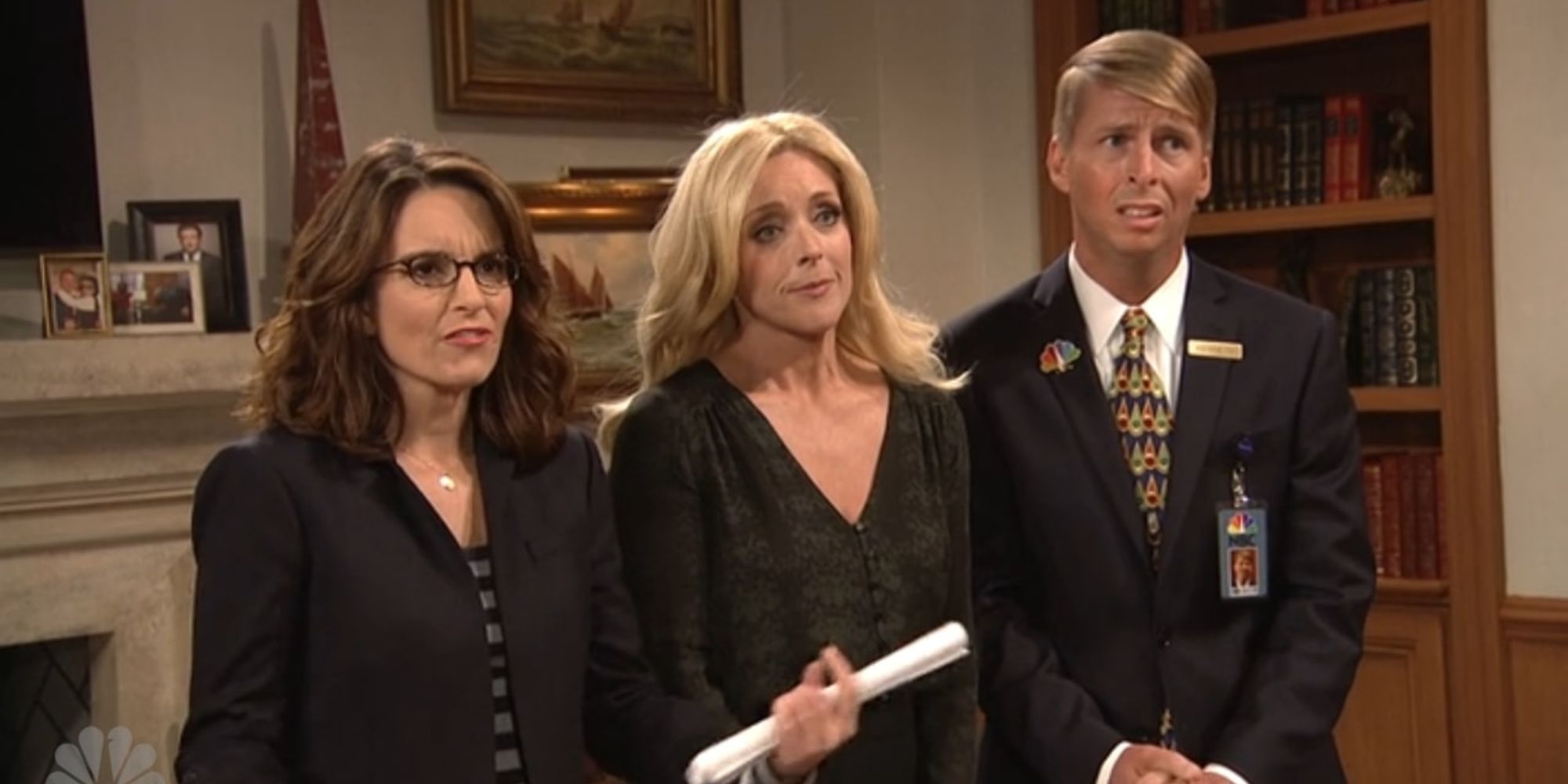 Liz Lemon (Tina Fey), Jenna Maroney (Jane Krakowski), and Kenneth Parcell (Jack McBrayer) looking timid and disgusted in 30 Rock