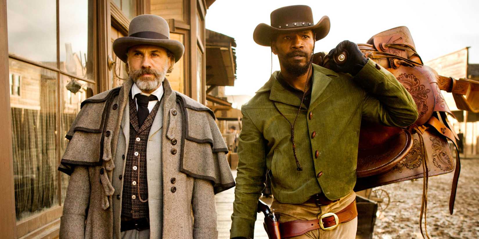 Christoph Waltz and Jamie Foxx walking together in Django Unchained