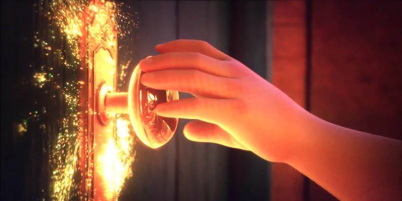 Mirabel's hand opening the door and magic glows from the doorknob