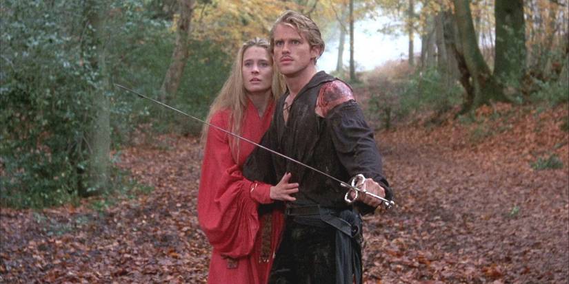 Westley holds out a sword in defense as he stands protectively in front of Princess Buttercup