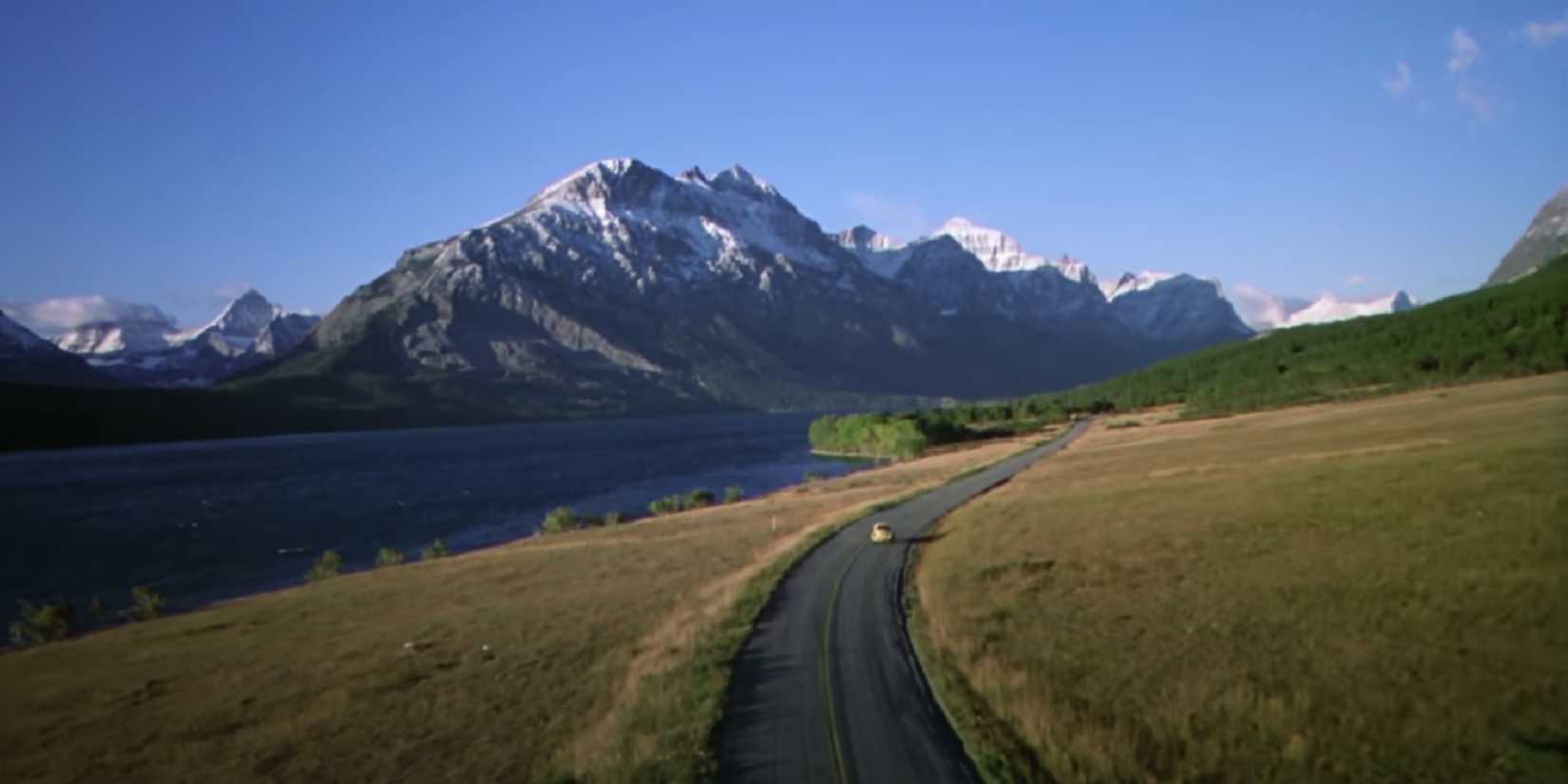 The Shining opening scene showing a car down a lonely road