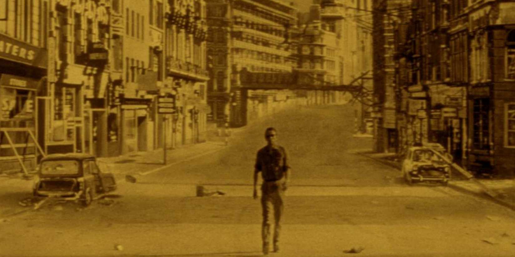 A man walking in a desolate city in The Day The Earth Caught Fire