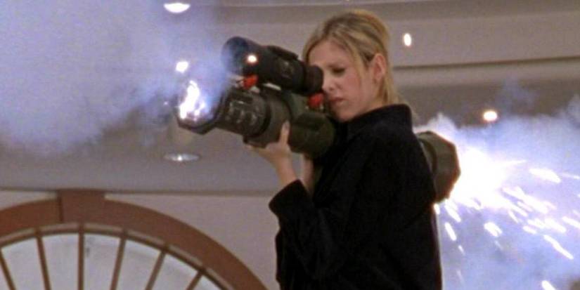 Sarah Michelle Gellar as Buffy Summers holding a bazooka