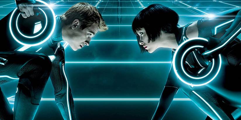 Garrett Hedlund and Olivia Wilde facing off in Tron: Legacy