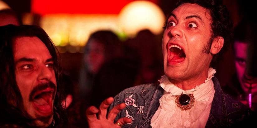 Viago and Vlasislav bearing their vampire teeth in What We Do In The Shadows