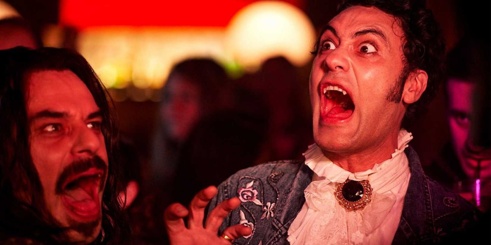 Viago and Vlasislav bearing their vampire teeth in What We Do In The Shadows