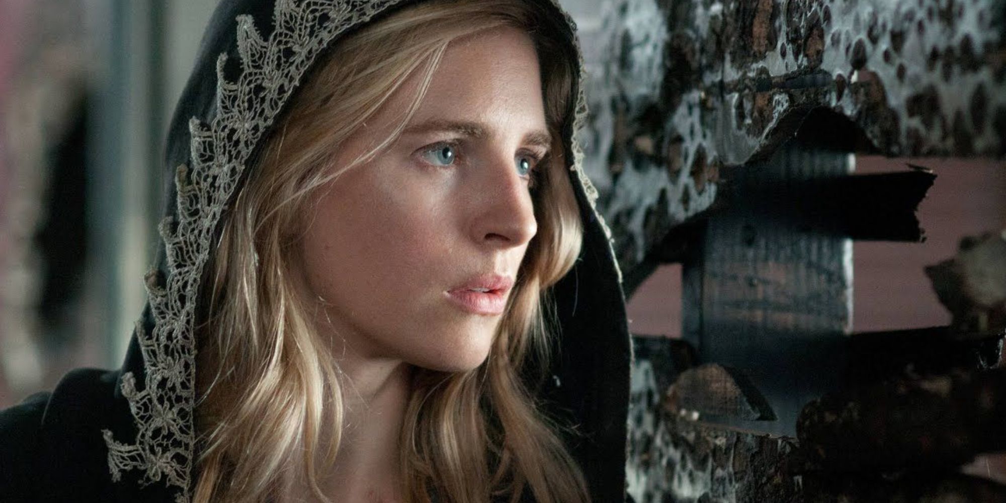 Brit Marling with a hood on looking out into the distance in The OA