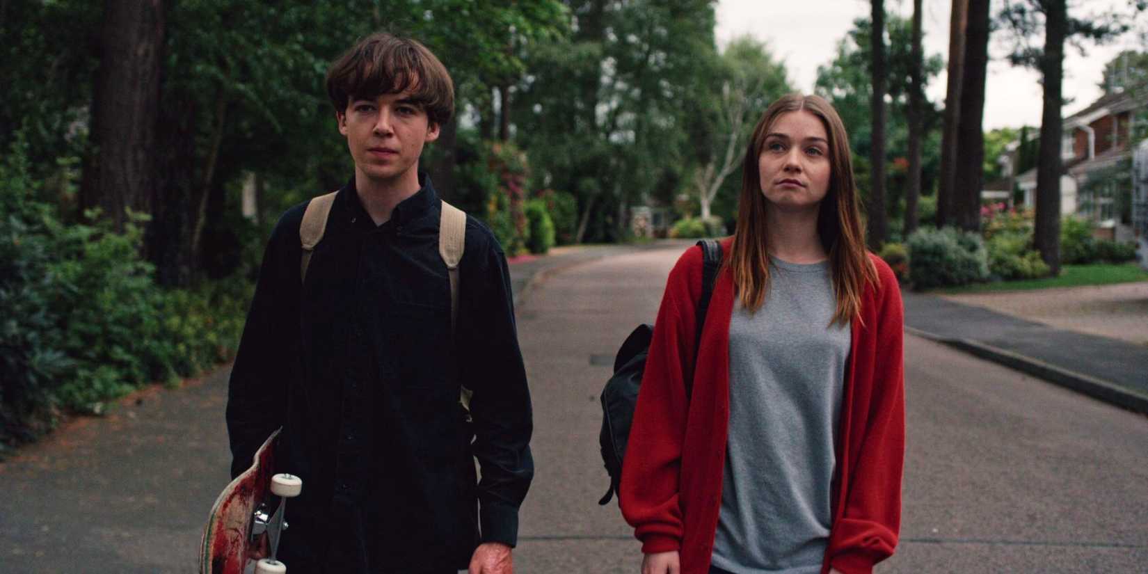 Alex Lawther and Jessica Barden in The End of the F***ing World walking side by side.